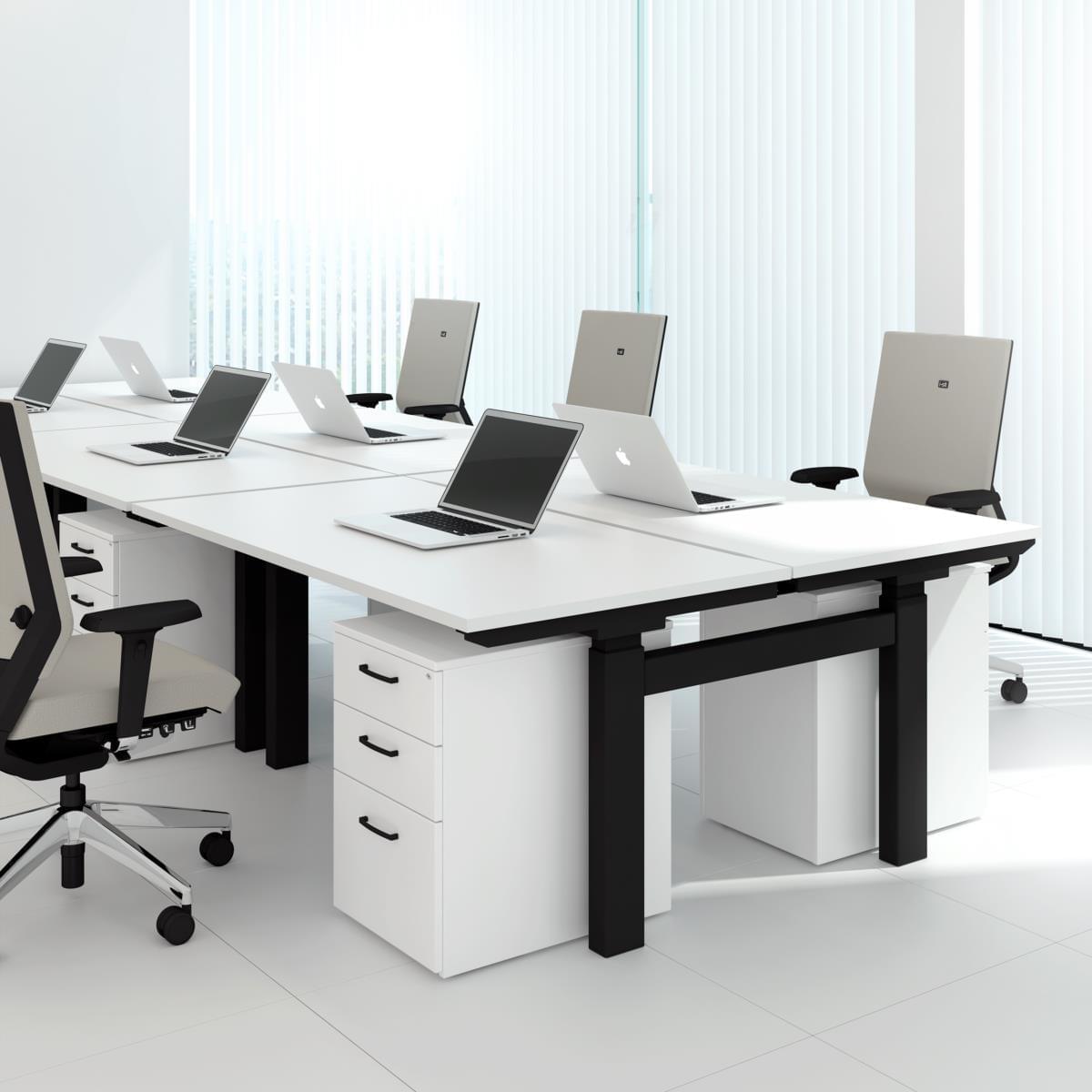 white Height Adjustable Desks with grey office chairs